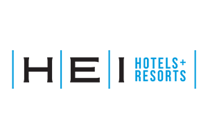 H E I hotels and resorts logo